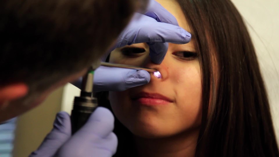 Doctor Examining Teen Girl Doctor Examining Teen Girl
